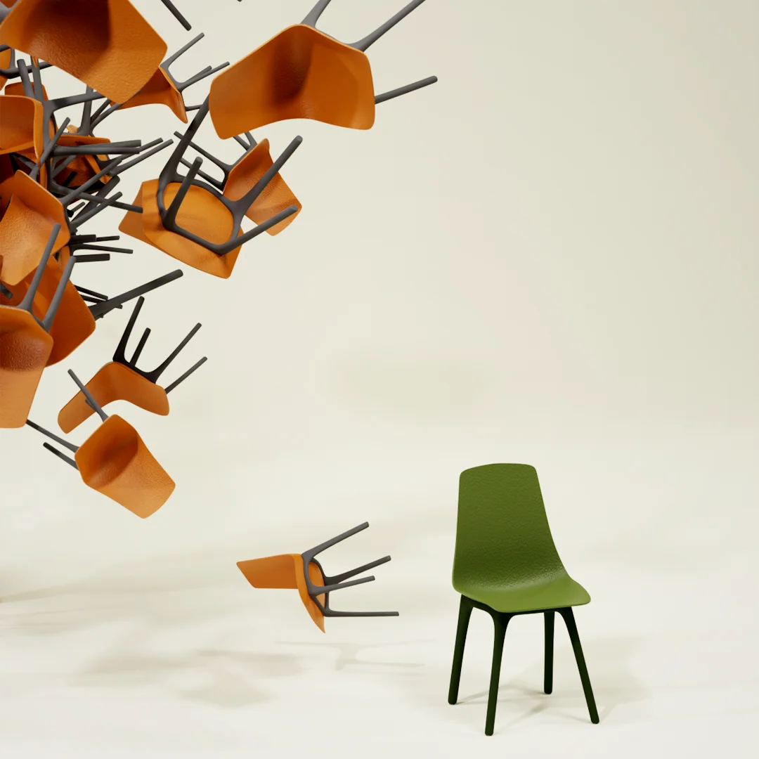 A green chair stands still while orange chairs fly around it, artwork by Venumadhav Pandit